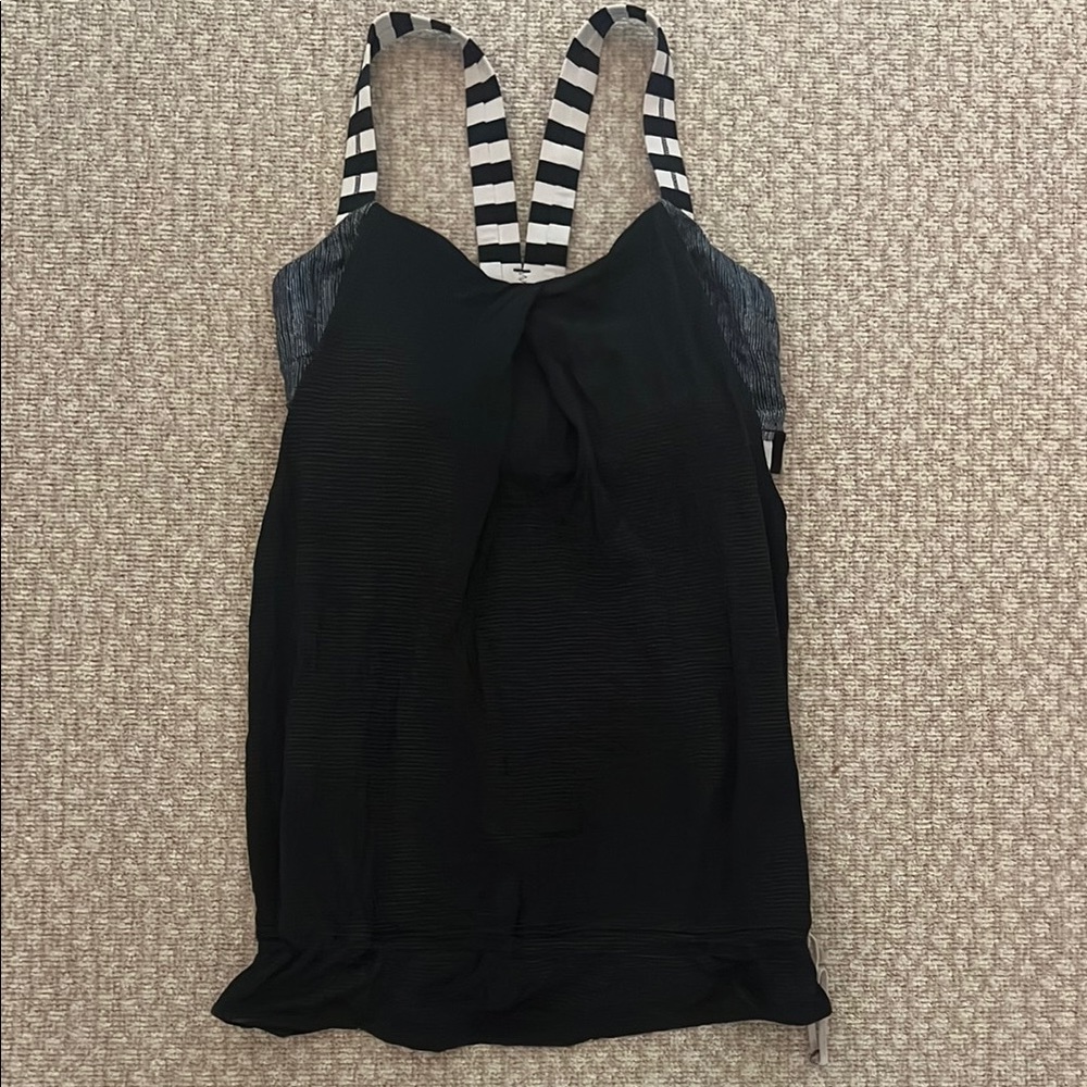 Lululemon top with drawstring and built in sports bra.